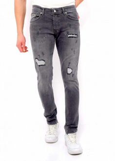 Slim fit jeans met scheuren dc - maat 30 Grijs