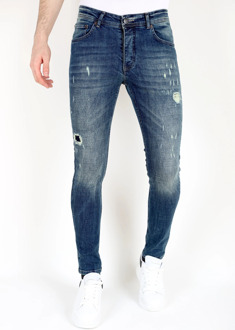 Slim fit jeans met scheuren mm118 Blauw - 33