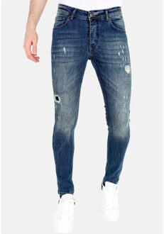 Slim fit jeans met scheuren mm118 Blauw - 38