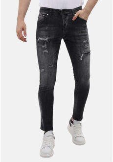 Slim fit stretch spijkerbroek met scheuren mm - maat 29 Grijs