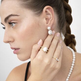 Sterling Zilver 925 oorbellen met witte parel afgewerkt in 18K geelgoud - Over