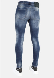 Stonewashed slim fit spijkerbroek met scheuren mm121 - maat 33 Blauw
