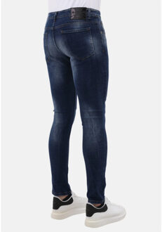 Strakke spijkerbroek slim fit jeans met scheuren mm - maat 34 Blauw