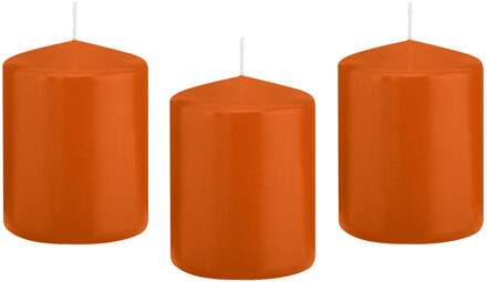 Trend Candles cilinder kaarsen - 12x - stompkaarsen - oranje - 6 x 8 cm - 29 branduren