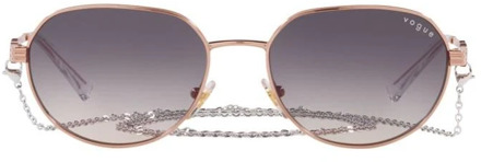 Vogue Rose Gold Sunglasses with Pink Shaded Lenses Vogue , Yellow , Dames - 53 MM