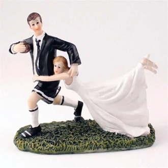 Wedding cake action figures decorate rugby love